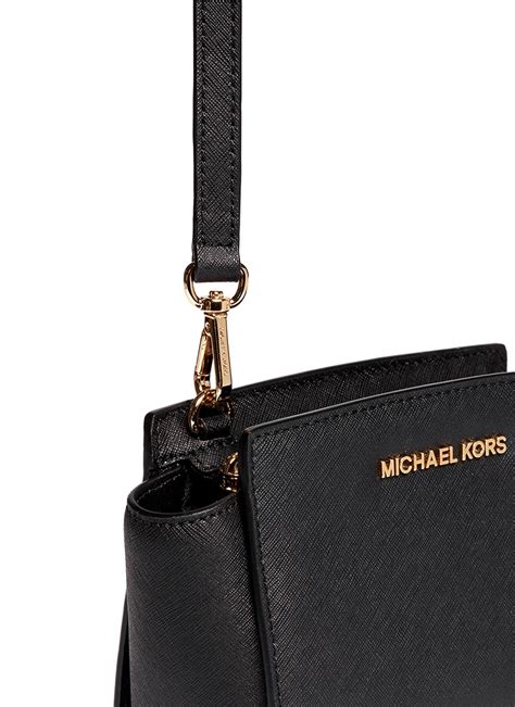 michael kors selma mini messenger black